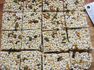 Hot sale sesame peanut candy cereal bar forming cutting machine rice cake making machine price